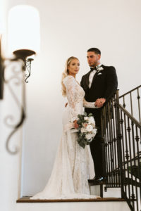 Bride and Groom On Grand Staircase